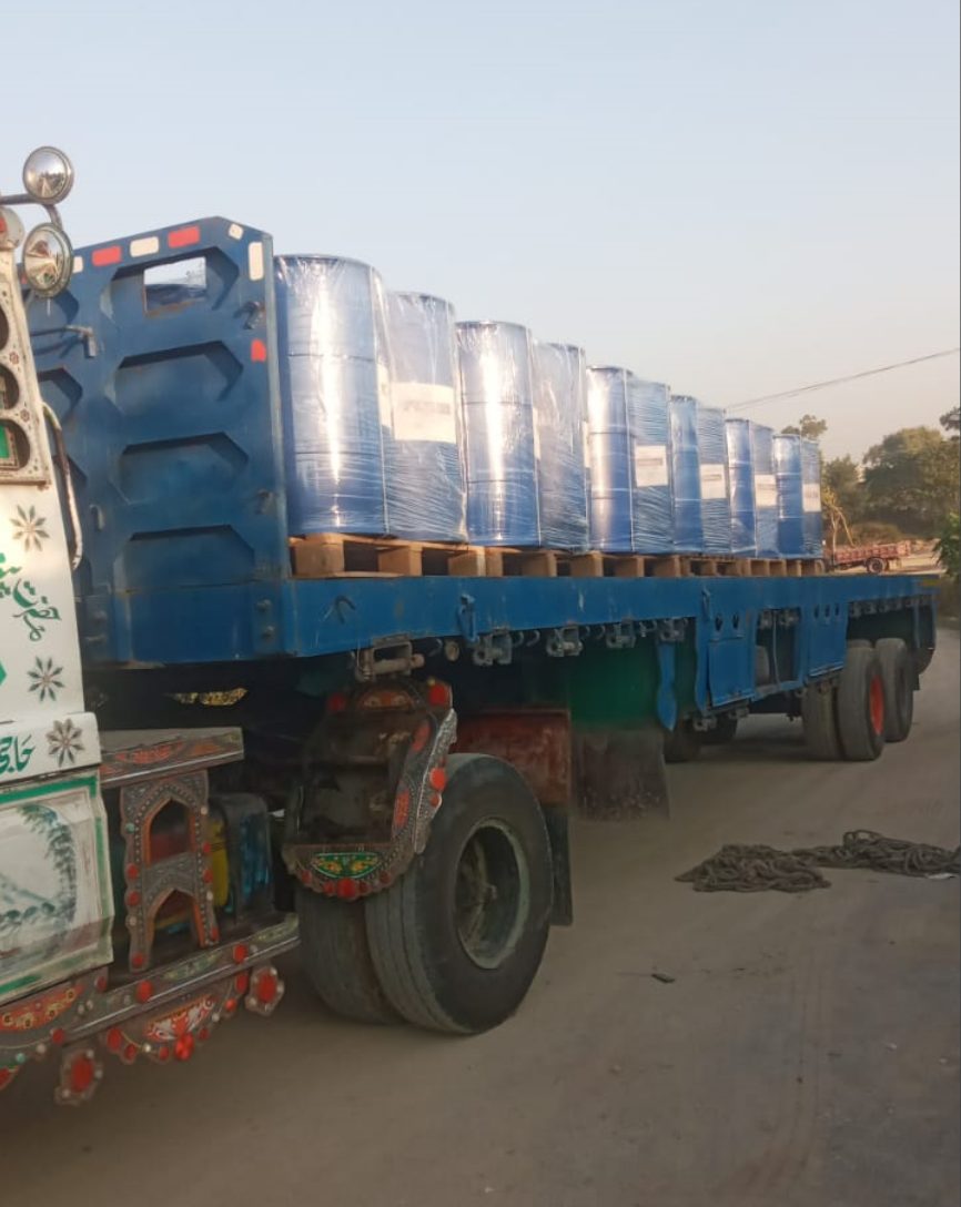 Truck loaded with chemical drums ready for dispatch
